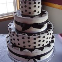 Black And White Cake This cake is covered with fondant. A cake for my cousins daughter.