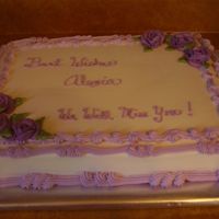 Purple And White Cake This cake is half white half choc for a girl leaving work. It has all buttercream icing.