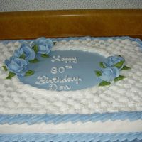 P1010086.jpg White sheet cake for 80th birthday in with buttercream icing.
