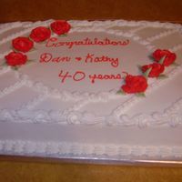 P1010534.jpg This is a large white cake with buttercream icing.