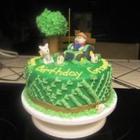 Tractor Cake fondant with fondant figures and buttercream accents