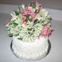 Fresh Flowers I made this cake for my Mom on Mother's Day this year. The flowers are fresh and the cake is covered with sotas.