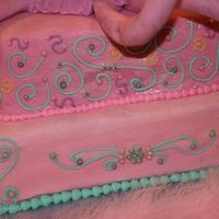 Side Of Octopus Cake scroll work on the sides..