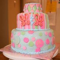 2 Martha's Cake This is a birthday cake for two ladies named Martha! The M's are gumpaste brushed with gold luster dust and vodka. The rest is MMF...