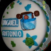 Baby In A Bed I made this cake for Miko on his Christening. That bell announces and welcomes him. The tree signifies his growth.