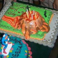 Volcano Cake I baked the volcano in my metal mixing bowl. I dumped lots of buttercream on top. Some of which dribbled on the side and Voila! An erupting...