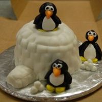 Penguin With Igloo My first attempt at MMF molding. White cake, MMF with carmel flavoring.