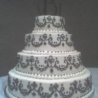 Brown Scroll Wedding Cake Bride picked this cake from a picture. lots of work! All white cake BC icing.
