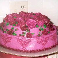 Burgundy Birthday Cake This is my MIL favorite color so I went all out for it. I used a metal embossing design for the side of the cake and spackled it on the...