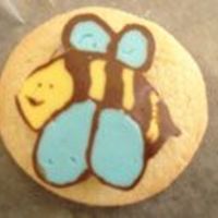 Bee chocolate transferes that my sister and i made in the morning and then just stuck onto the cookies with royal
