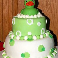 Green Rubber Ducky This is a cake made for my friend. I went looking for a yellow duck, but only found green. I then changed the whole cake idea to fit the...