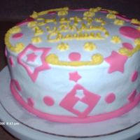 Happy Birthday Charisse This is a lemon cake with lemon bc frosting and raspberry filling. The designs are fondant accent pieces. The cake was for my niece...