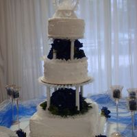 Teache' Wedding Cake - Second View This is a sour almond cake with pineapple filling and bc icing. This is a copy of a picture that my new daughter-in-law wanted for her...