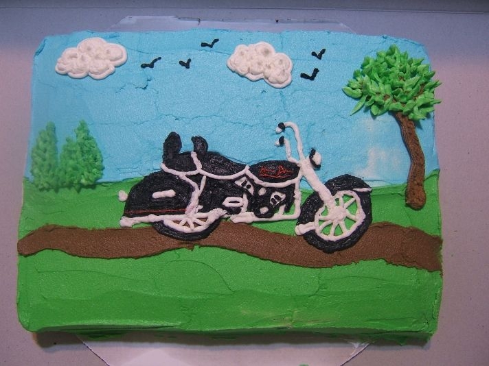 Allen's Bike Cake Freehand piped motorcycle and scenery