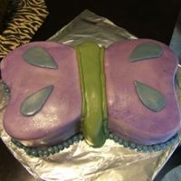 Butterfly This is a 2 12in choc cakes carved in the butterfly shape, rolled buttercream all over including accents