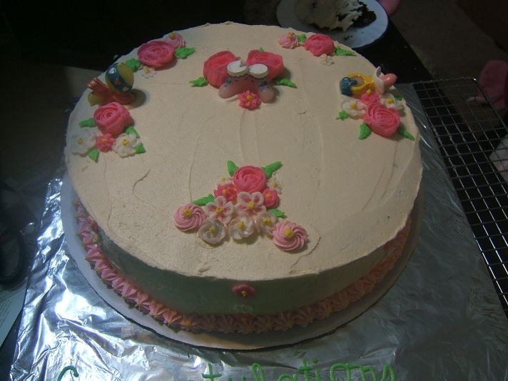 Shabby Chic Baby Shower This was for a baby shower, two 12inch chocolate cakes with buttercream. Includes buttercream flowers and some wax candles.