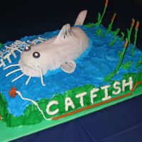 Catfish 7Th Birthday Made for my nephew who's nickname is Catfish! He loved the cake and it was a blast making it!!!!!1/2 choc, 1/2 white with BC , Royal...
