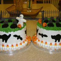 Matching Cakes For My Boys To Take To School Incredibly easy cake. The fence is royal icing. The mummy, gravestones, pumpkins and cutouts are fondant. There's candy corn around...