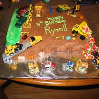 Construction Cake I did this cake for my son's 3rd birthday. My husband, who is an electrician and has seen his fair share of construction sites, helped...