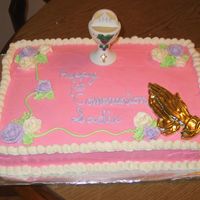 Pink !st Communion Cake I made this cake for my daughter's 1st communion this year. Pink is her favorite color. I wasn't sure about a bright pink cake...
