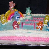 Care Bear Cake I made this cake for my daughter who adores Care Bears. The figures and rainbow were from her collection of Care Bear toys.
