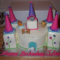 Littlest Pet Shop Castle inspired by a couple on this site - buttercream with real littlest pets - this was a HUGE hit with the little girls at the party!