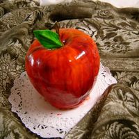 Red Delicious Apple Devils chocolate cake with chocolate frosting, covered with fondant