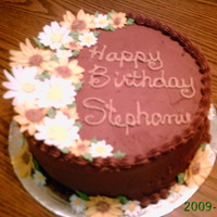 Daisy B-Day Cake the flowers on this cake are made of chocolate the rest is BC