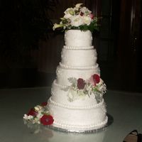 Round Cake, Scrollwork, 5 Tier, Inspired By This Site!` The bride had shown me a picture from this site...bottom tier is buttered pecan, next is white with Raspberry filling, then chocolate with...