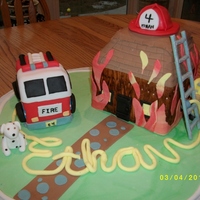 Fireman Cake This is a fireman cake I did for a little boy's birthday. Fondant for just about everything. Fire engine and house are cake. Fireman,...