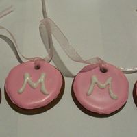 Lemon Zest Sugar Cookies Sugar cookies flooded and tied with ribbons. A gift for my neice's birthday.