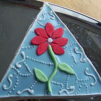 Triangle Flower Cake Just something different... in the shape of a triangle.