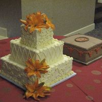 Orange Lilies Buttercream and beautiful orange lilies for the bride and groom - Texas Longhorn fans