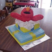 Elmo Cake this is my elmo cake for a 1 year old boy. The elmo is made of rice krispies and covered with butter cream. Enjoy