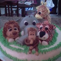 The Jungle Babies This is a cake I did for a baby shower, The jungle babies was the theme of the baby room for the expecting couple. Every Bit of it is...