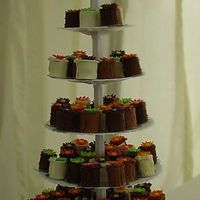 Abigail's Wedding Mini Cakes mini chocolate cakes on a tower stand- cup cakes, really!