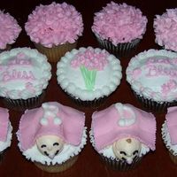 Baptism Cupcakes ...Did these for a baptism. All buttercream except for the pink blankets. Made enough of the babies to spell out the girl's name.