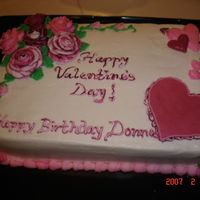 Valentine's Day/birthday Cake Made for co-workers for Valentine's Day, plus a lady's birthday. Strawberry flavored cake with butter/vanilla flavored...