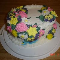 Course Ii Final Cake Made with a Spice Cake and vanilla/butter flavored buttercream icing. All the flowers were made from Royal icing except for the Mums. I was...