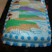 Lighthouse We made this for our brother's birthday. It is a spice cake with buttercream icing and cream cheese icing filling.