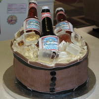 Budweiser Beer Barrel Cake Retirement cake for a friend's father who loves Budweiser. My first attempt at sugar beer bottles. Thanks to BRATTYR for answering my...
