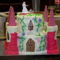 Castle Cake buttercream cake with fondant accents, towers are made from ice cream cones.