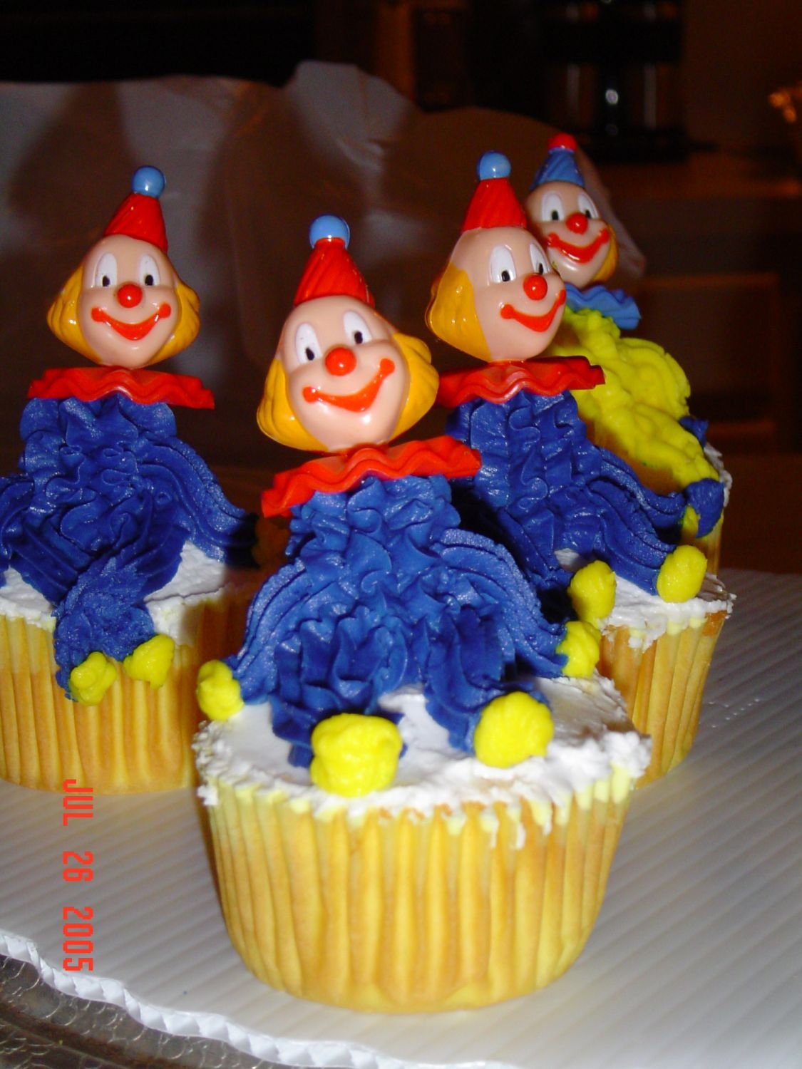 Clown Cupcakes I am taking the Wilton I course and these were what we made in class. They at yellow cake cupcakes with buttercream frosting.