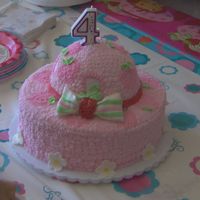 Eden's 4Th Birthday Cake Strawberry Shortcake's Hat! A yellow cake with fresh strawberry and cream filling. The icing is BC (almond and butter flavors). The...