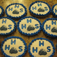 School Reunion My mom wanted cookies for her high school reunion; fondant over buttercream, edible image of school mascot.