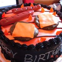Grill Birthday Cake Made this out of classic buttercream and chocolate buttercream. The hotdogs, hamburgers, and flames are made out of fondant. Fudge cake...
