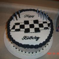 Chevy Birthday Cake Practicing using Color Flow, I am still in Wilton Course 2. This is a black walnut cake with ablack walnut filling. Icing is buttercream.