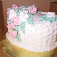 Basket Weave Cake This is a vanilla cake with chocolate bavarian cream filing. The design is based on one of the Wilton Course cakes. Some of the flowers are...