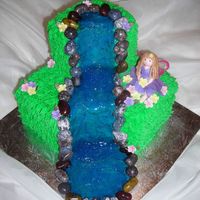 Suzanne's Fairy Cake BC "grass", gumpaste fairy and flowers