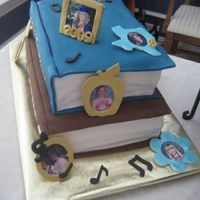 Graduation Books Graduation book cake with gumpaste picture frames.